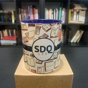 Libros y logo de SDQ Lee